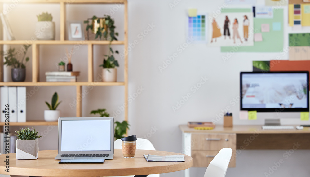 Empty business office interior with a laptop and computer on a desk or table with a professional des