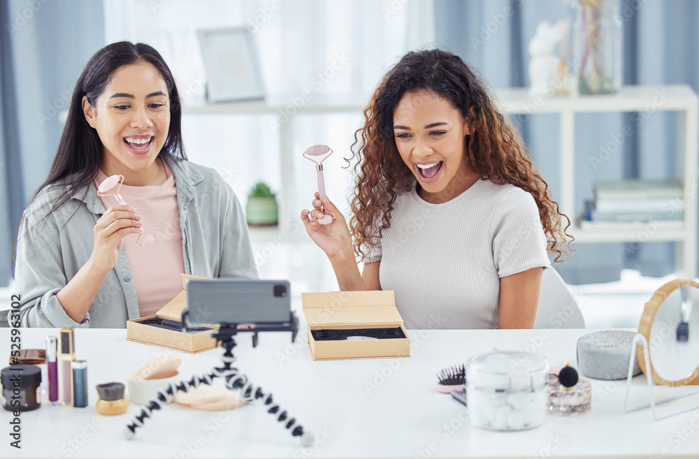 Happy influencer doing makeup review video podcast for online beauty blog or vlog using her phone at