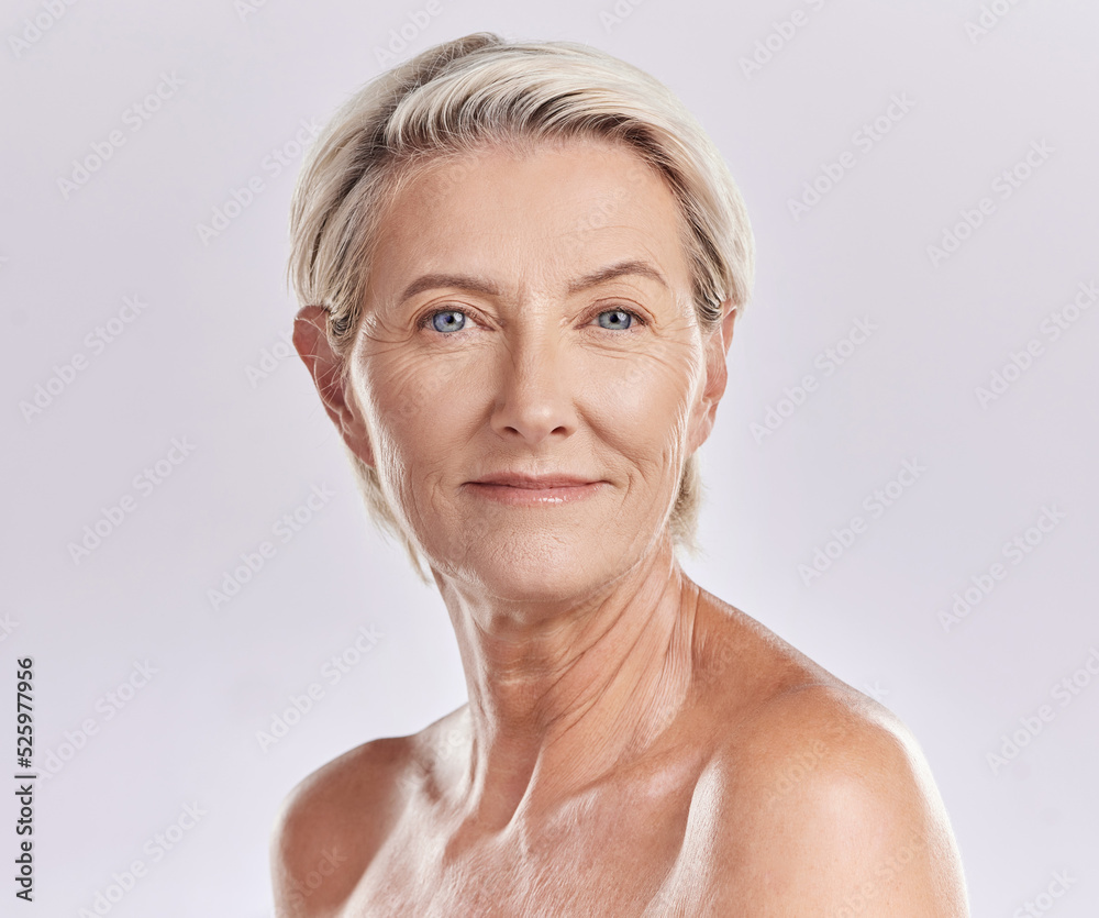 Beauty, skincare and wellness with a senior woman in studio isolated against a grey background. Face