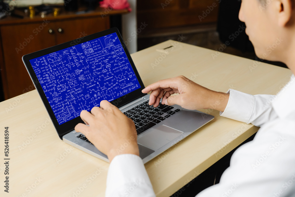 Mathematic equations and modish formula on computer screen showing concept of science and education