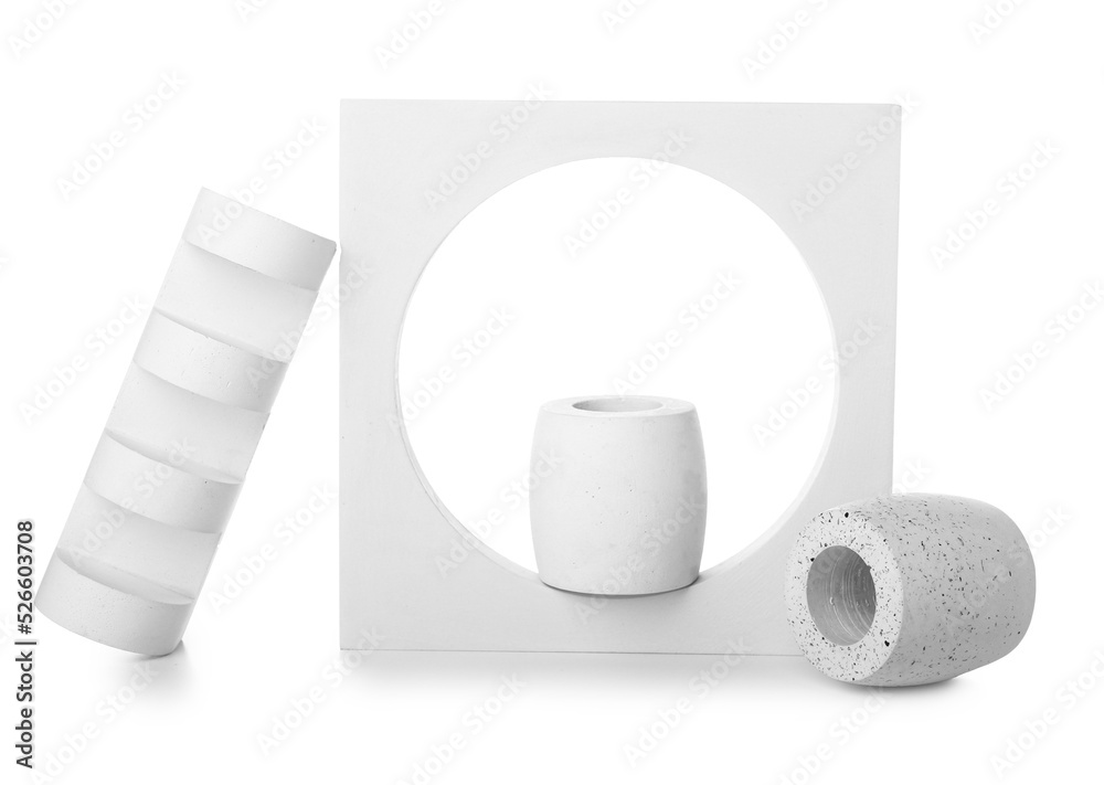 Different decorative podiums for presentation of cosmetic products on white background