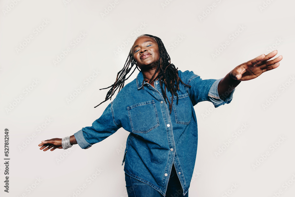 Blissful mature woman having fun in the studio