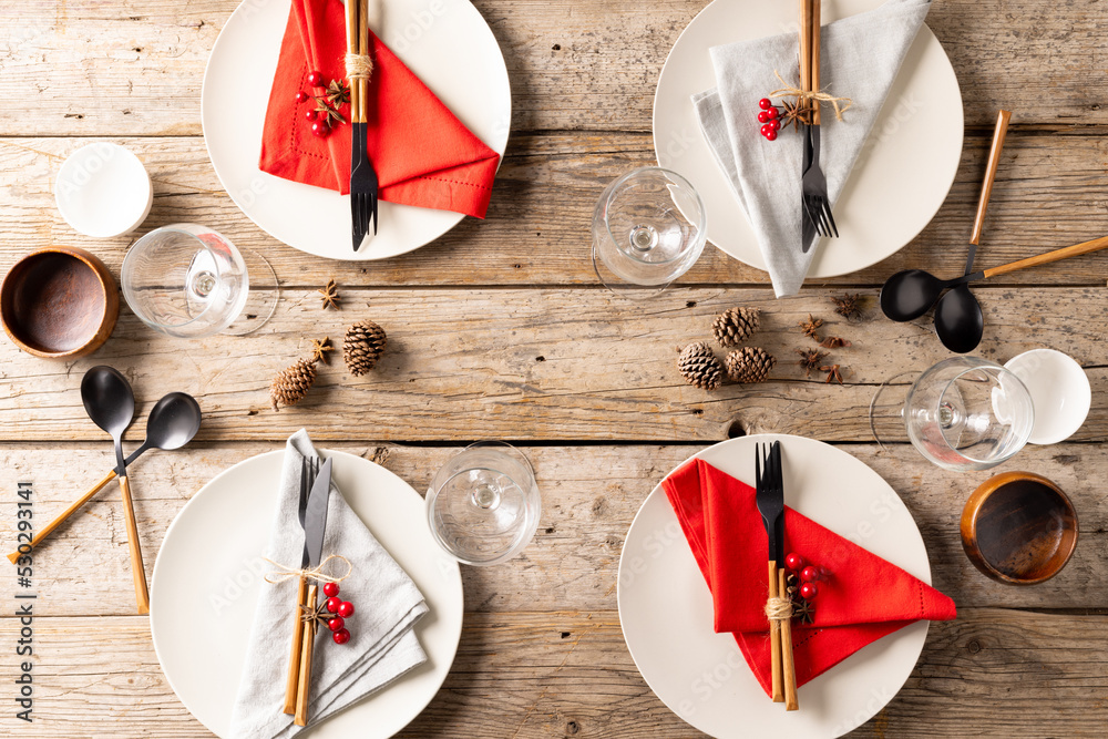 Overhead view of thanksgiving table setting with autumn decoration on wooden background