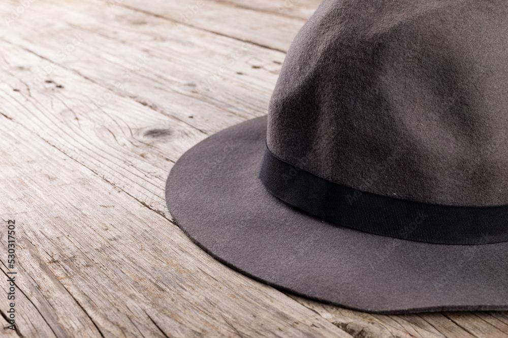 Image of wool hat lying on wooden surface