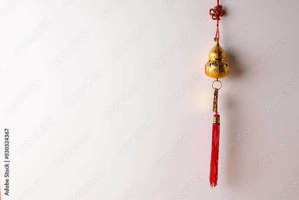 Composition of red chinese decoration on white background