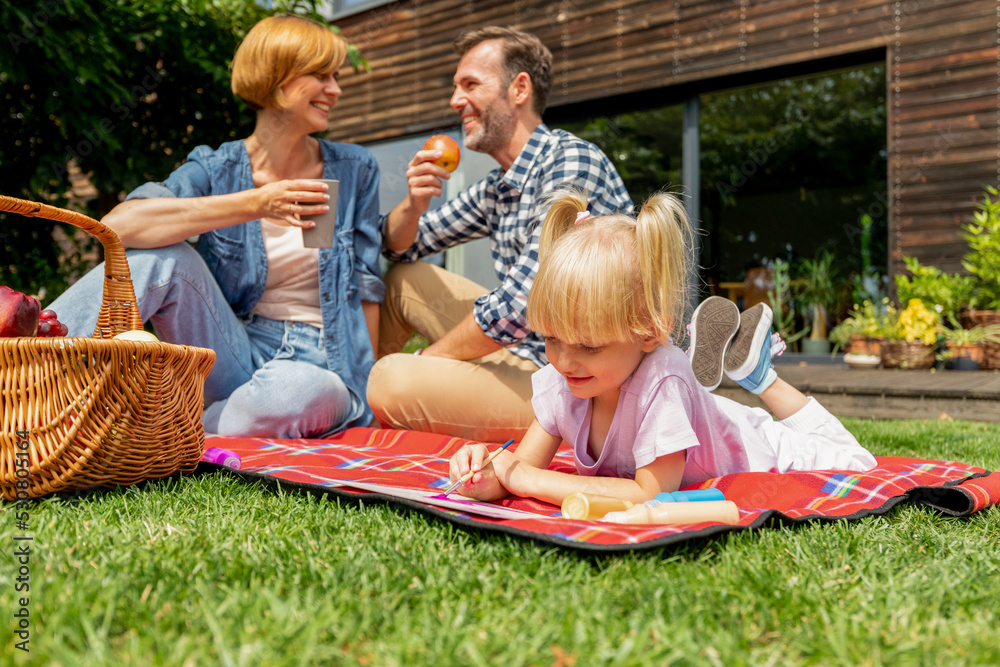 Family play together and spending joyful moments in backyard