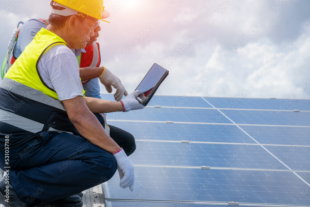 Technician checks and maintenance of the solar panel at solar power plant,Solar panels.