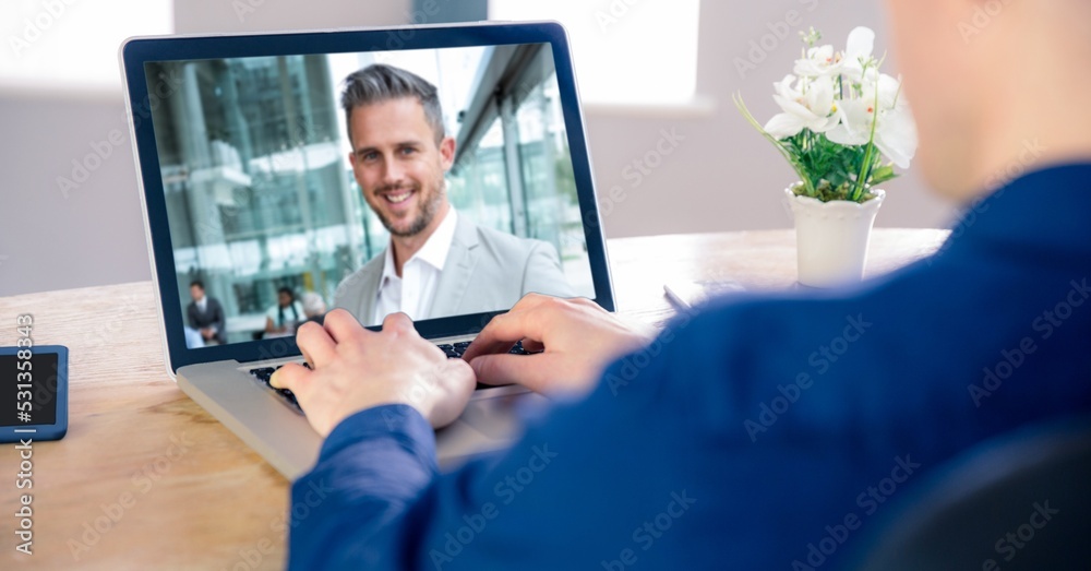 Man having video call on laptop.