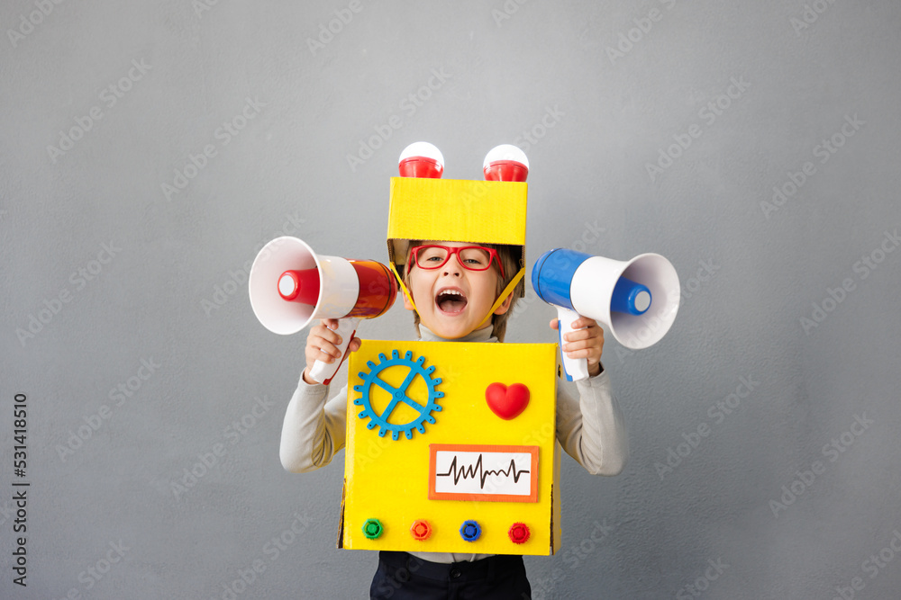 Happy child wearing a robot