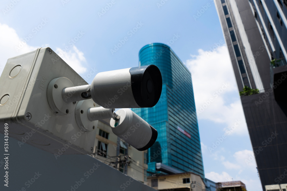 CCTV camera background with copy space. Outdoor CCTV watching camera for security and safety home fr