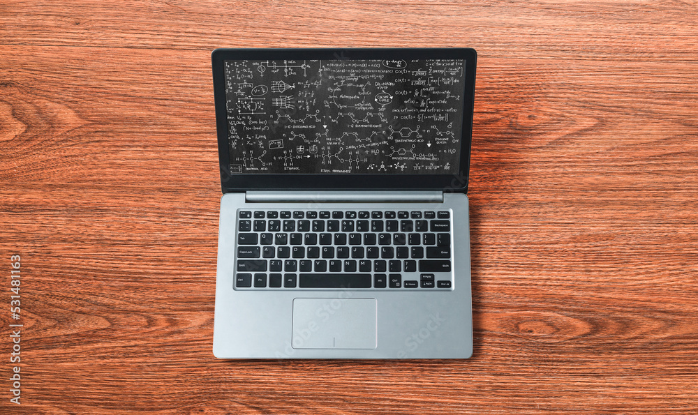 Mathematic equations and modish formula on computer screen showing concept of science and education