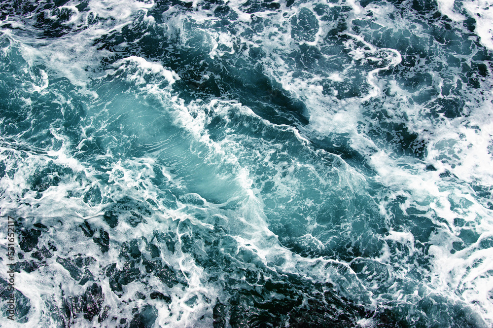 Aerial view to ocean waves.