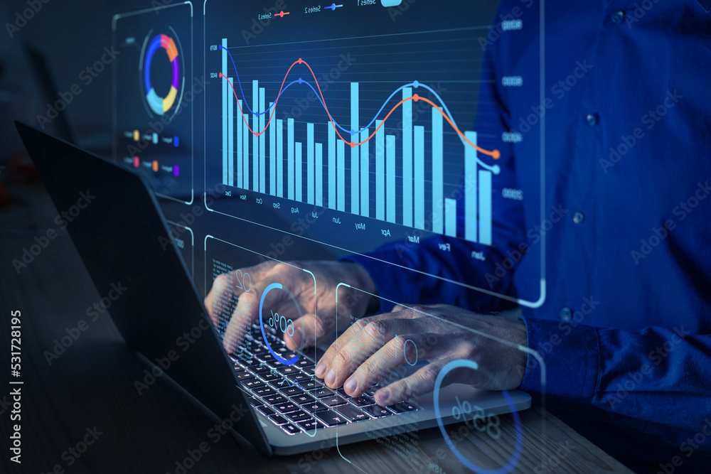 Data analyst working on business analytics dashboard with charts, metrics and KPI to analyze perform