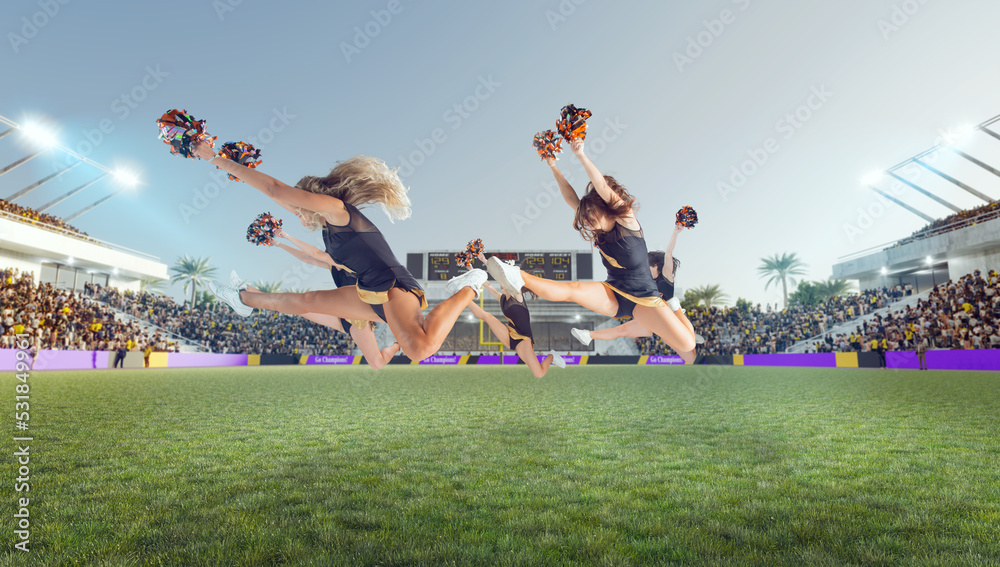 Group of cheerleaders in action on  stadium