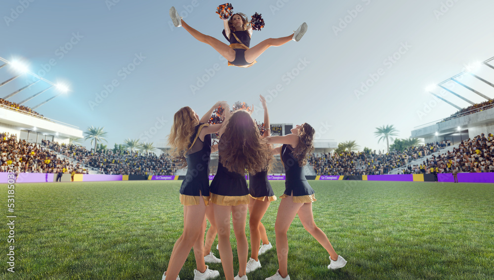 Group of cheerleaders in action on  stadium