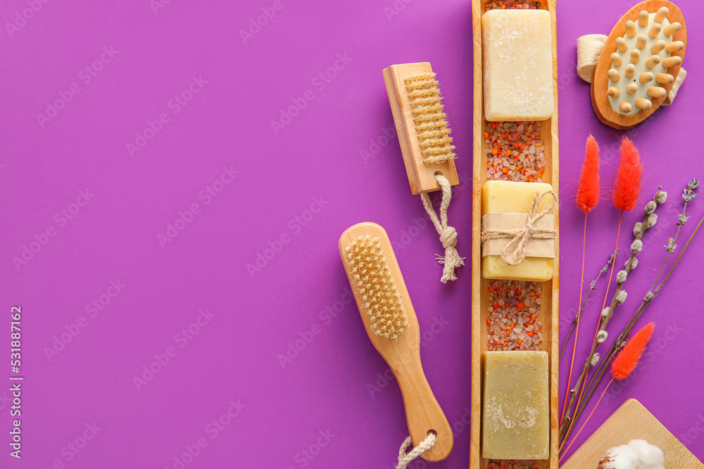 Set of bath supplies on purple background