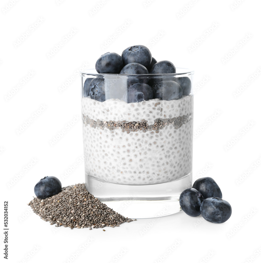 Glass with delicious chia seed pudding and blueberry on white background