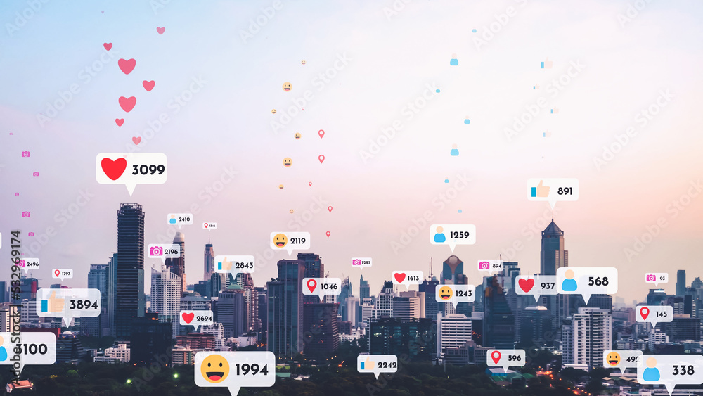 Social media icons fly over city downtown showing people reciprocity connection through social netwo