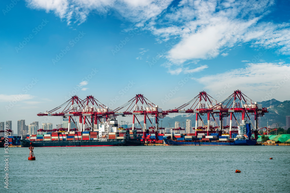 Dock cranes loading containers, trade port, shipping