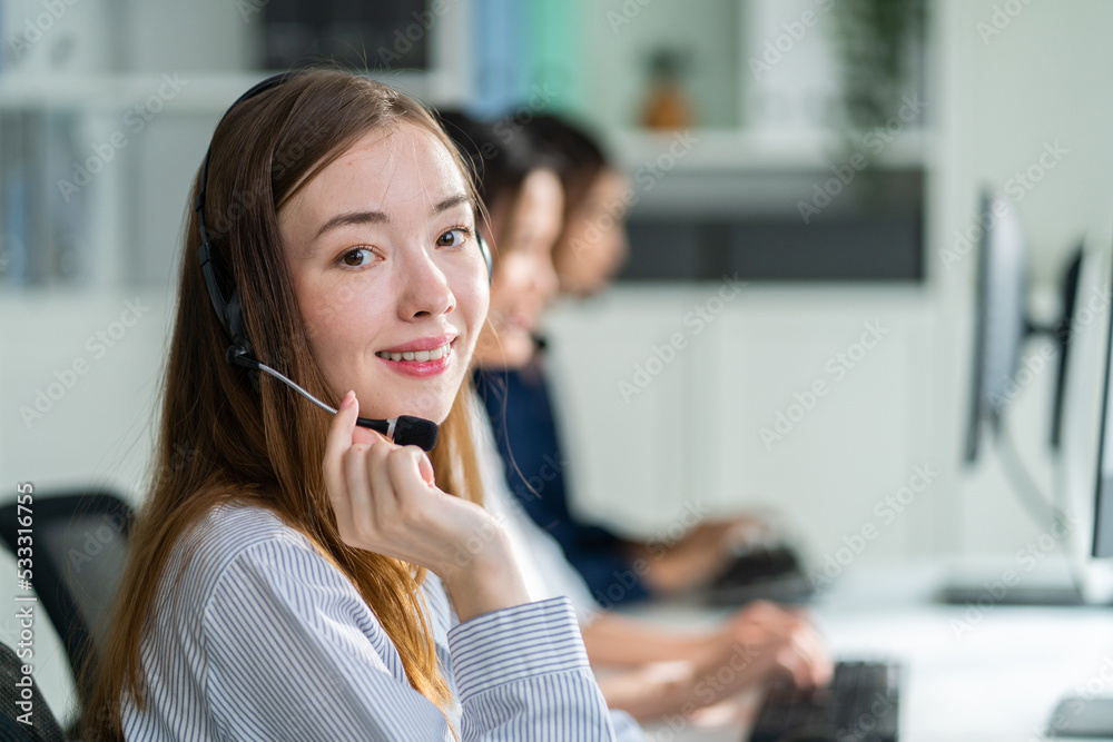 Portrait of Caucasian young business woman call center work in office.