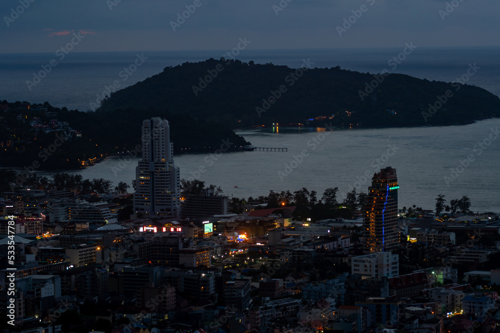 Landscape of patong city phuket in sunset evening time Beautiful tropical sea High angle view