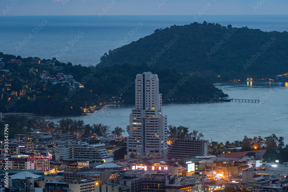 Landscape of patong city phuket in sunset evening time Beautiful tropical sea High angle view