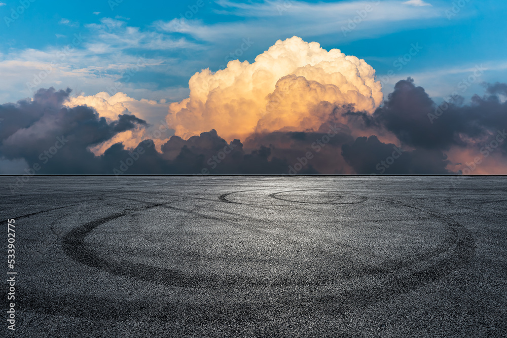 Empty asphalt road platform and beautiful sky cloud scenery at sunset