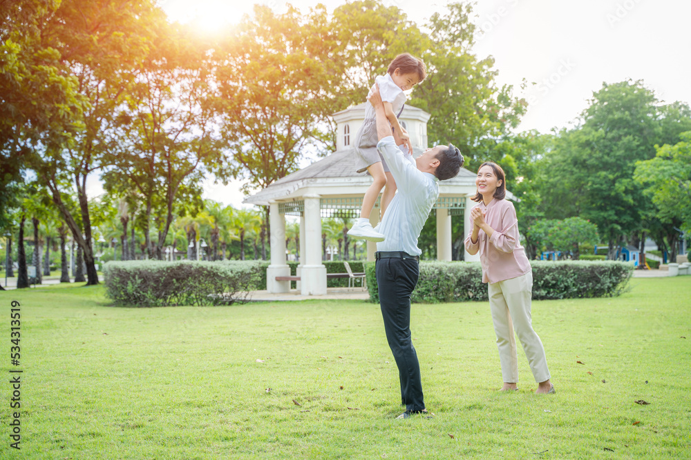 Happy family spending time together at park,Family happiness love concept.