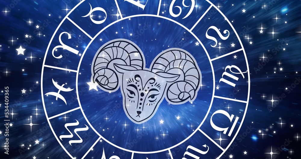 Image of aries star sign symbol in spinning horoscope wheel over glowing stars