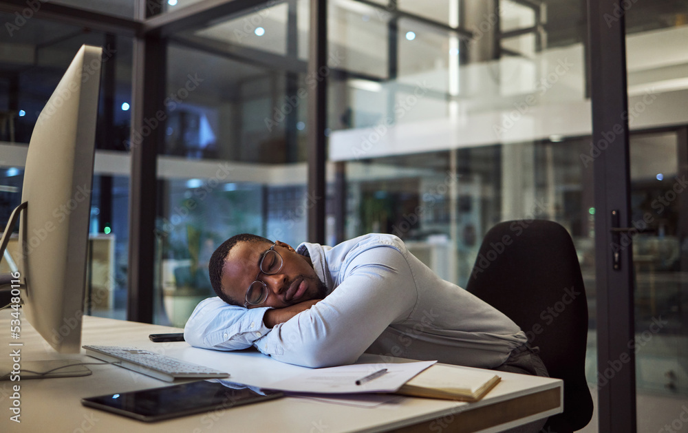 Night business, work sleep and businessman sleeping at desk with computer in dark office at a corpor