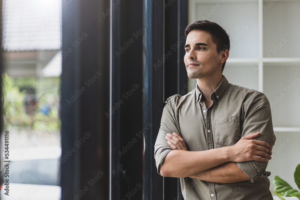 Portrait of a handsome young businessman in the office.