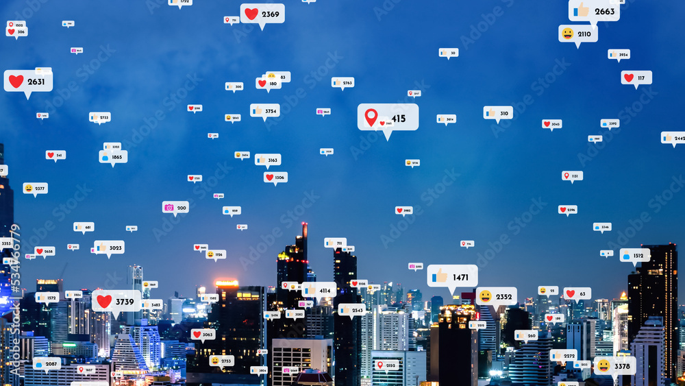 Social media icons fly over city downtown showing people reciprocity connection through social netwo