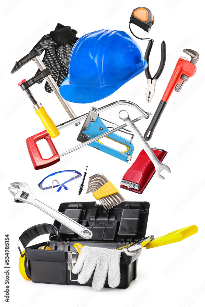 Bag with set of construction supplies on white background