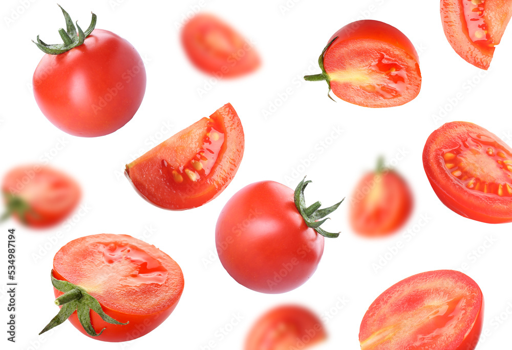 Fresh flying tomatoes isolated on white