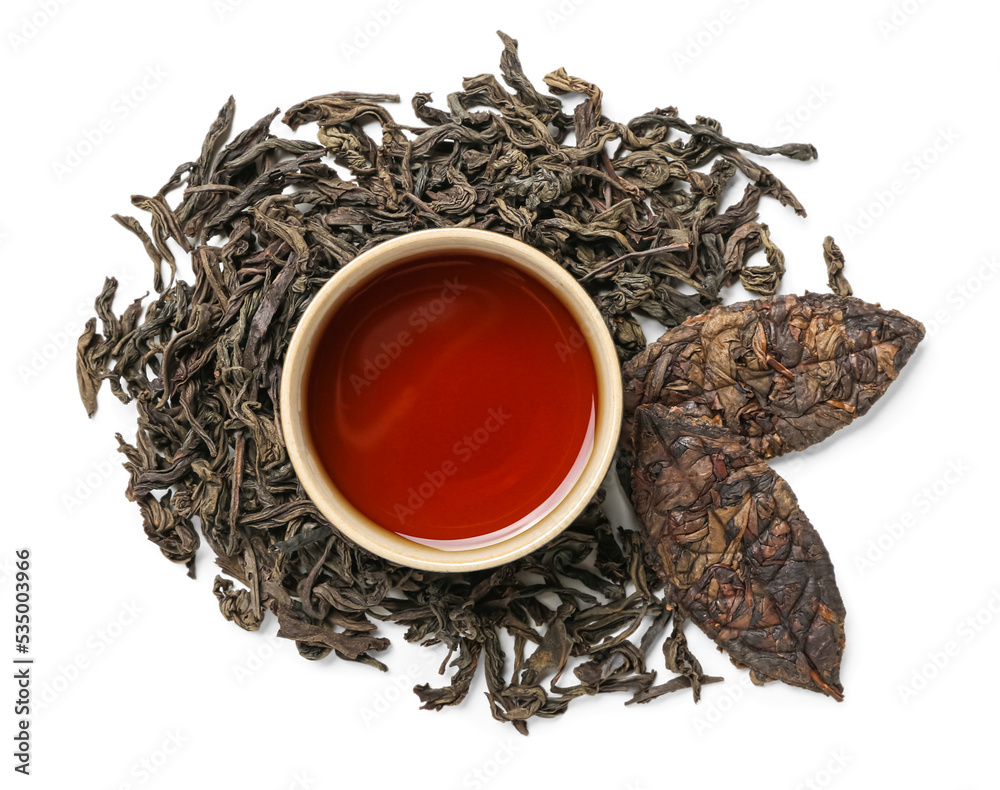 Dry puer tea with cup on white background