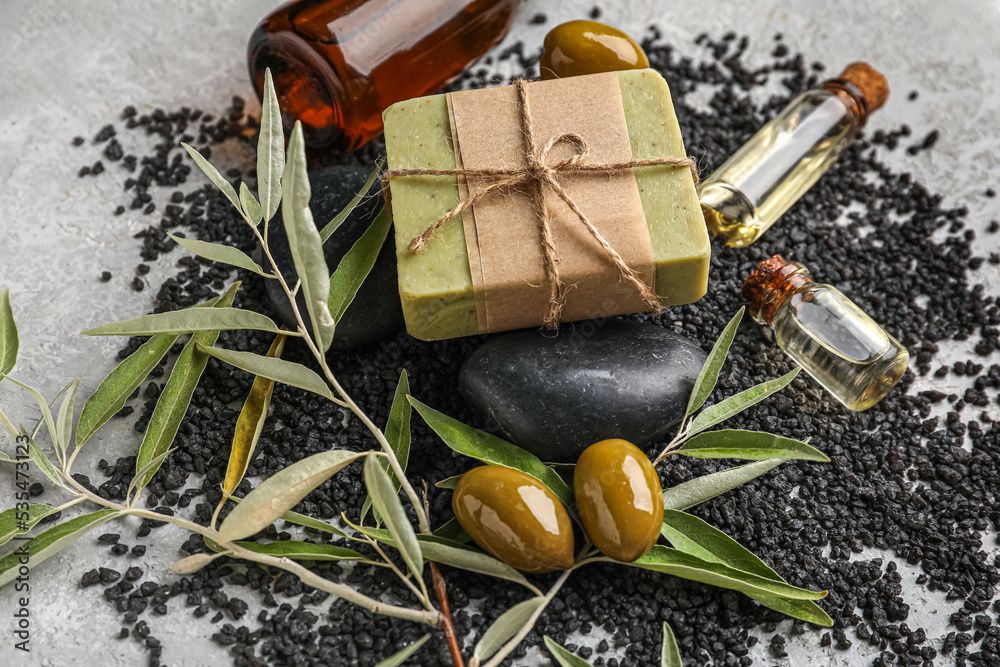 Olive soap bar on table, closeup