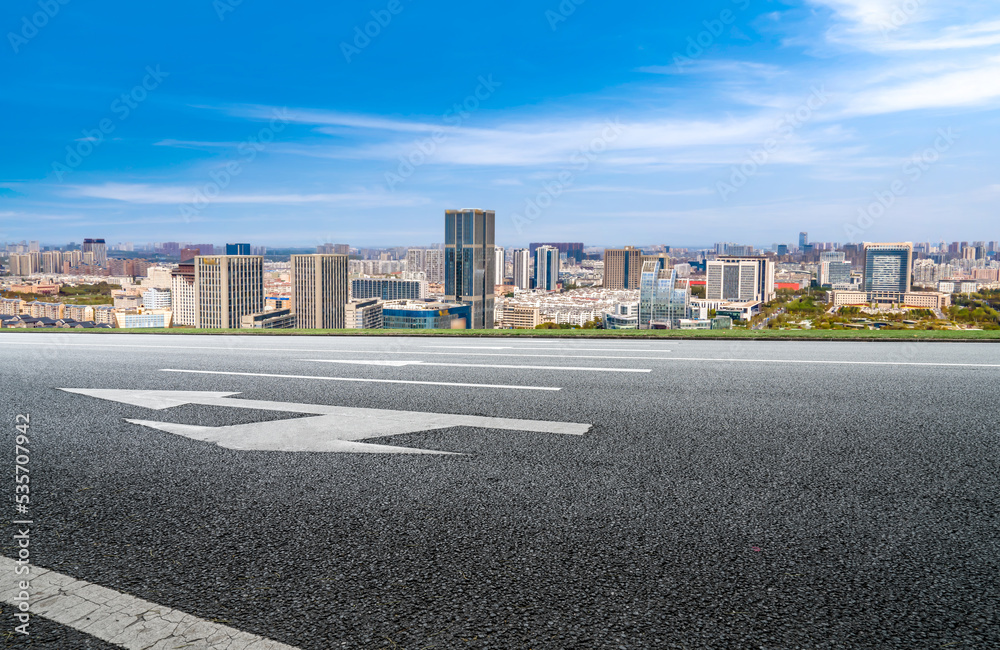 Road and modern city buildings landscape skyline