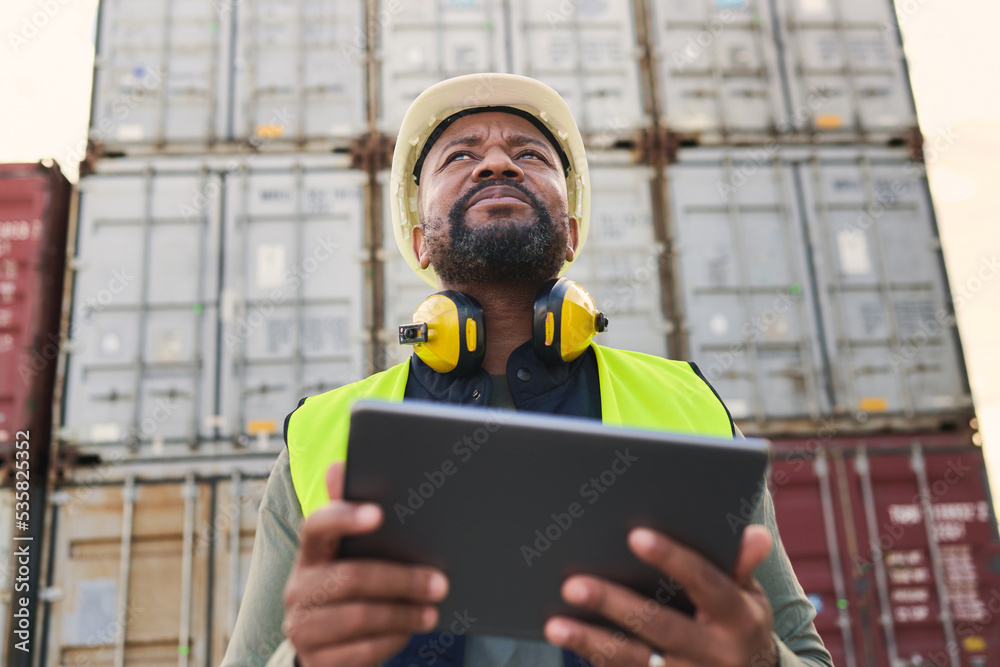 Logistics, tablet and black man doing container inspection at an industrial cargo, shipping and frei