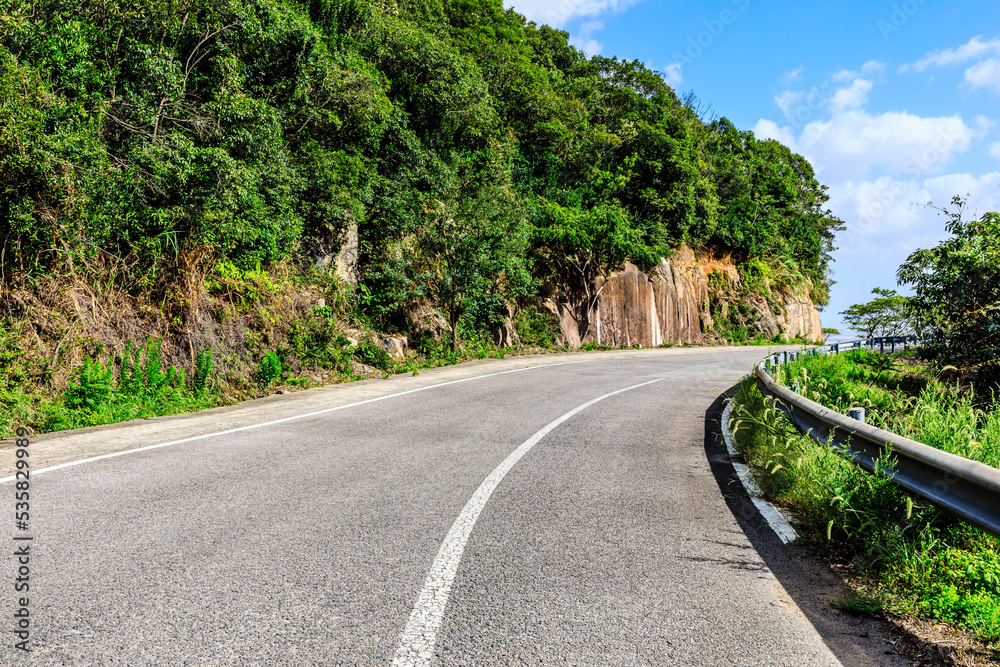 Asphalt road and mountain natural scenery background