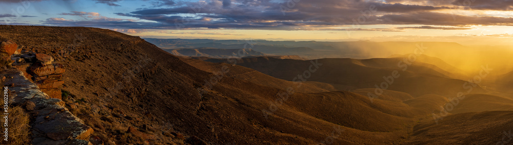 Dramatic sunset view from the edge of the Roggeberg Escarpment into the Tankwa Basin near Sutherland