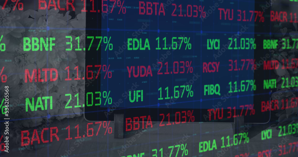 Image of stock market data processing against close up of a digital tablet