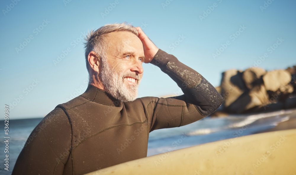 Elderly, man and beach to surf in summer for wellness, fitness and health on adventure. Senior, ocea