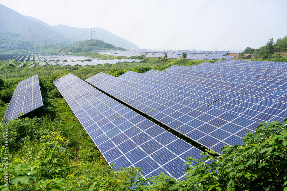 solar power station in farm during sunset