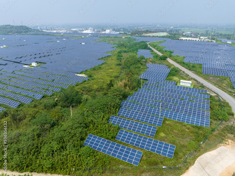 solar power station in farm during sunset