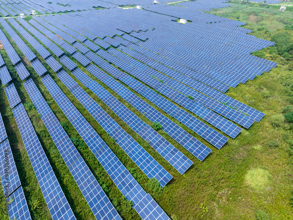 solar power station in farm during sunset