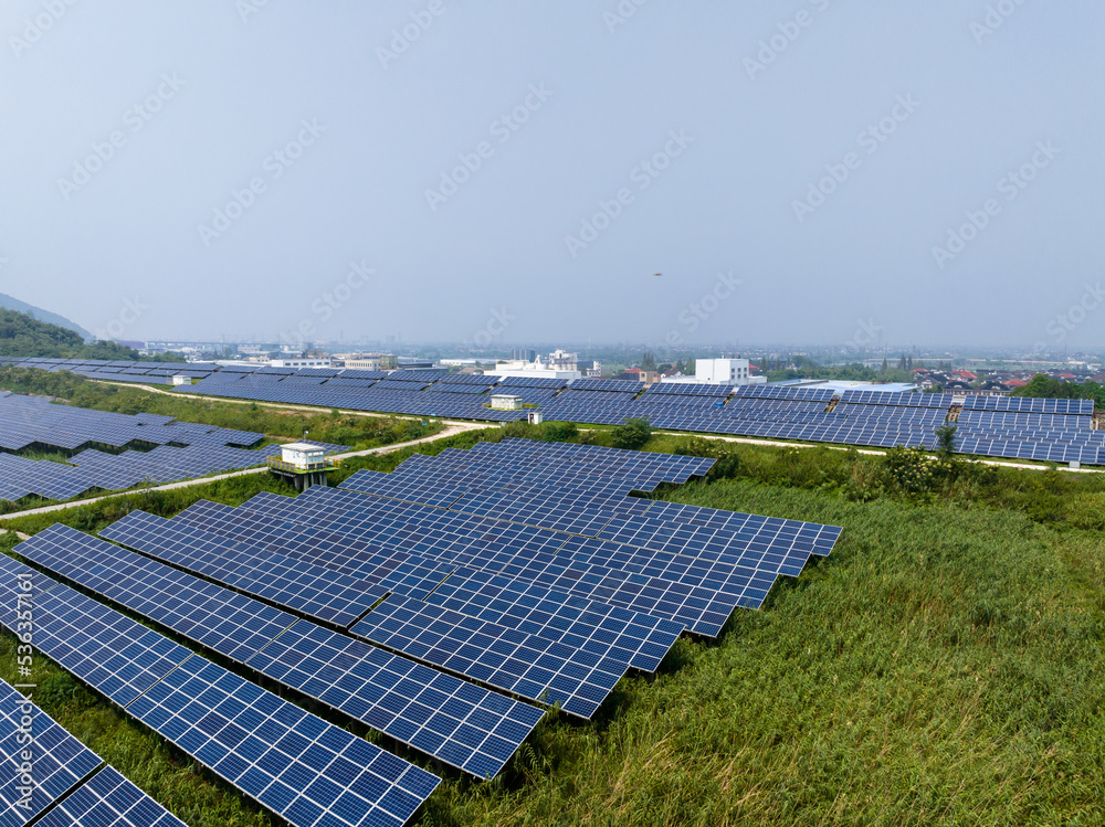 solar power station in farm during sunset