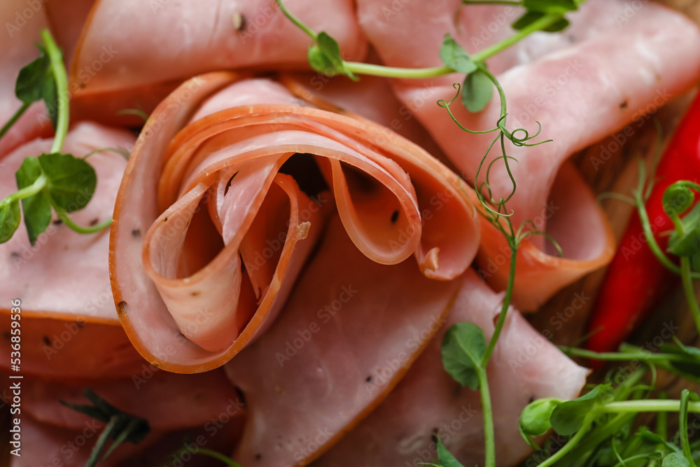 Slices of tasty ham with microgreen, closeup