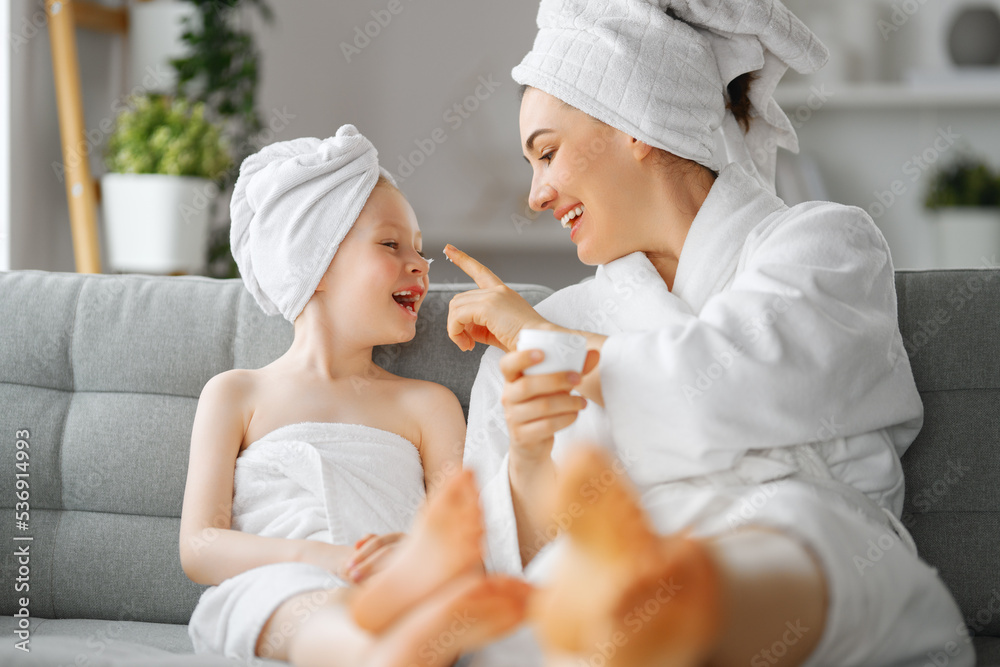 Mother and daughter after a bath