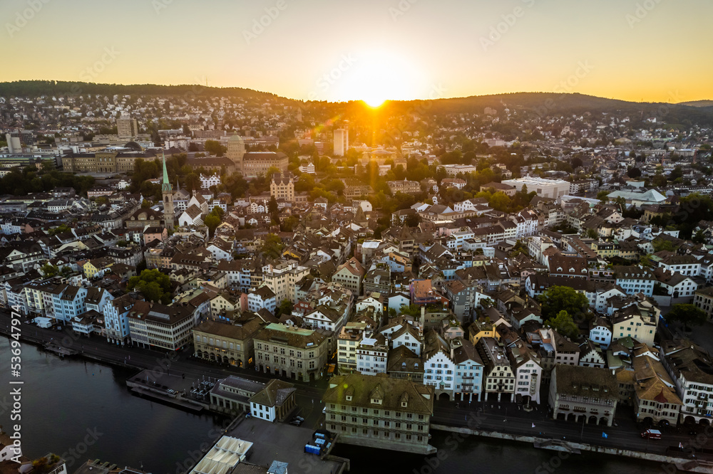 Aerial drone shot flying above Lake Zurich, Switzerland in sunny day. 