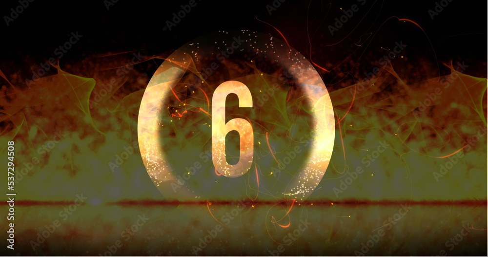 Image of ring and glowing number six in dramatic countdown over flaming fire background